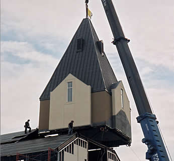 Holy Trinity Catholic Church placing the steeple